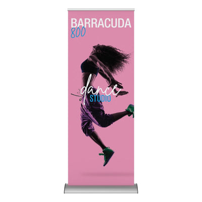 Trade show banner stand featuring dynamic dance studio advertisement with jumping dancer silhouette