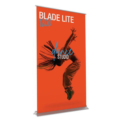 Banner stand displaying dynamic dancer image and text for trade show and exhibition promotion