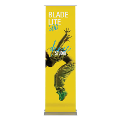 Retractable banner stand showcasing dynamic dancer image and text for trade shows and special events