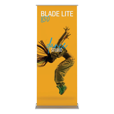 Retractable banner stand featuring dynamic dancer image and dance studio branding for trade show displays