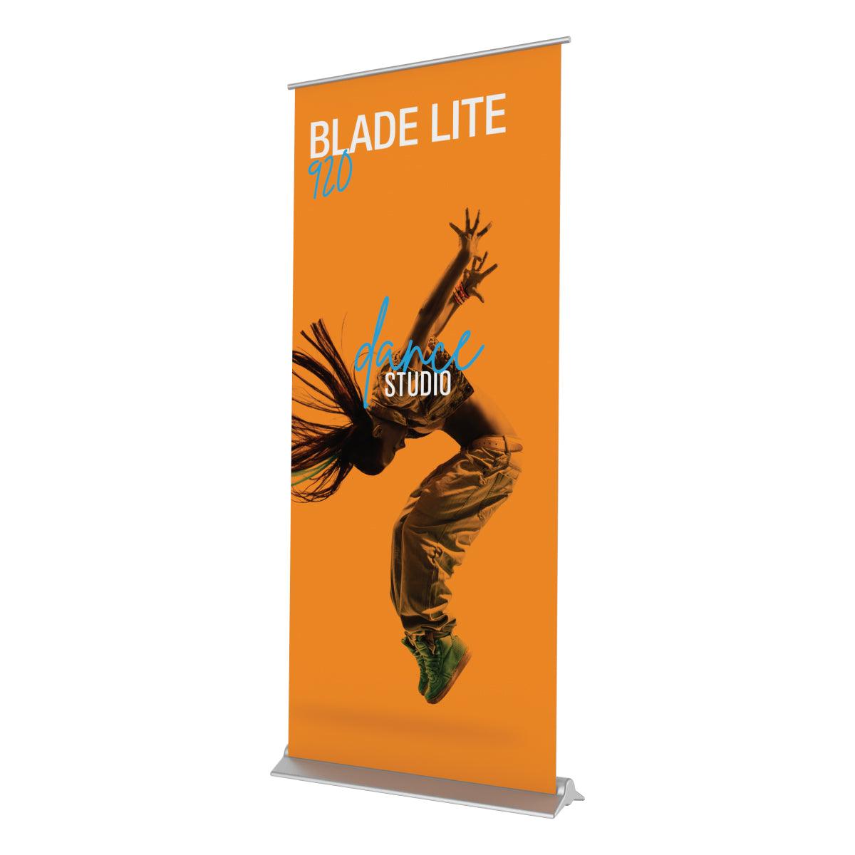 Retractable banner stand featuring dynamic dance studio advertisement for trade shows and exhibitions
