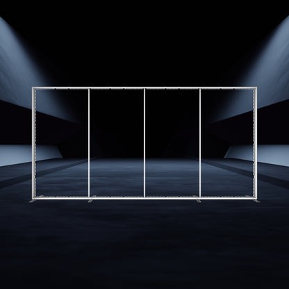 Modular trade show backdrop frame with multiple vertical panels in a dark exhibition space