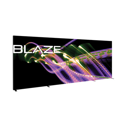 Large trade show light box display with abstract swirl graphic and BLAZE branding