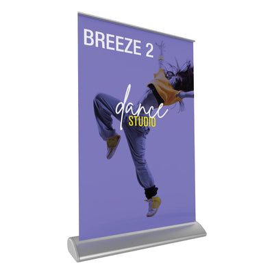 Retractable tabletop banner stand displaying dance studio promotion for trade shows and exhibitions