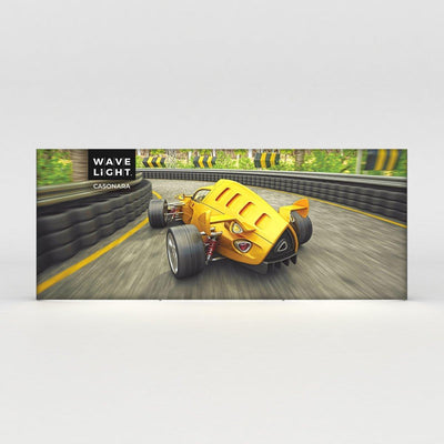 Large backlit trade show display featuring a race car on a curving track for exhibition use