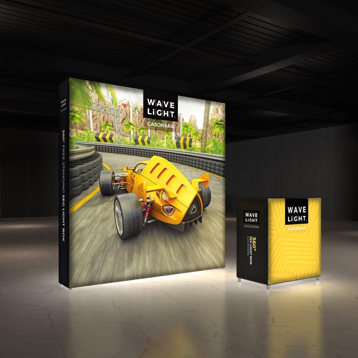 Backlit trade show display featuring race car graphic and matching illuminated counter for exhibitions