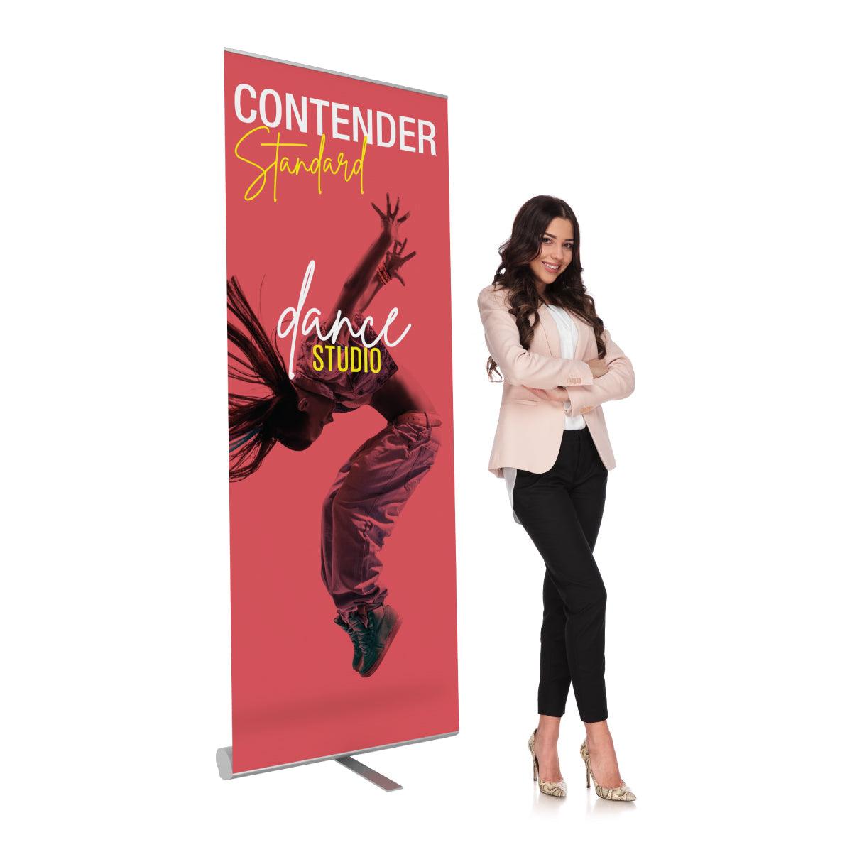 Contender Standard banner stand displaying dance studio ad next to businesswoman at trade show