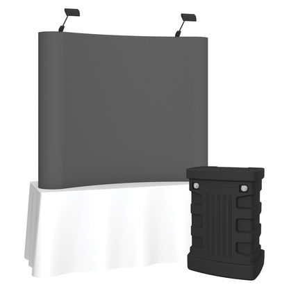 Curved fabric tabletop display with white tablecloth and carrying case for trade shows and exhibitions