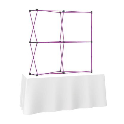 6ft curved collapsible mural frame on table for trade show and exhibition displays