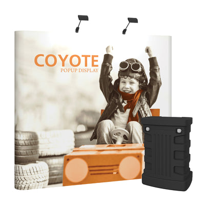 Trade show popup display featuring a curved backdrop with child driving a toy car and portable case