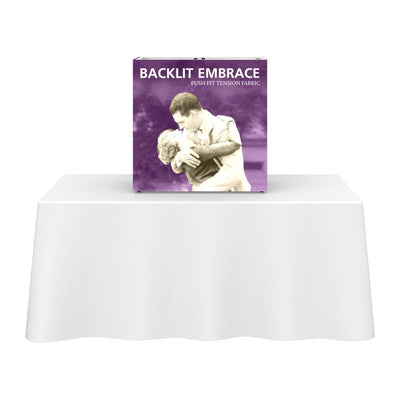 Backlit tabletop display with tension fabric graphic for trade shows and exhibitions on covered table