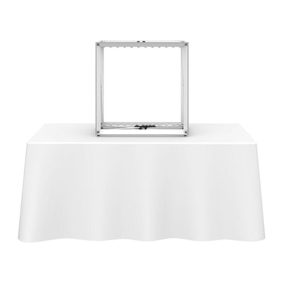 Backlit tabletop display frame on a table with tablecloth for trade shows and special events