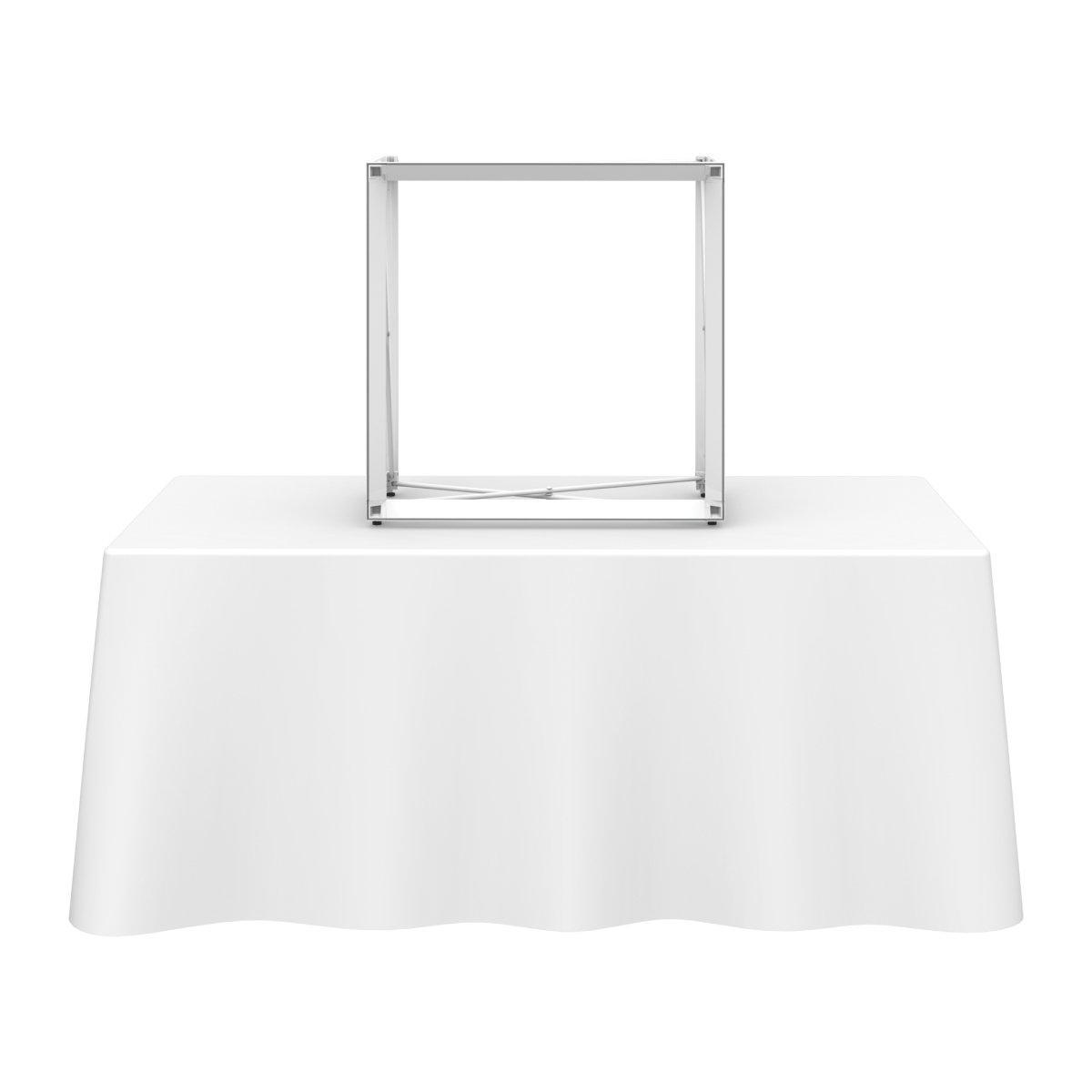 Tabletop display frame on table with tablecloth for trade shows and exhibitions
