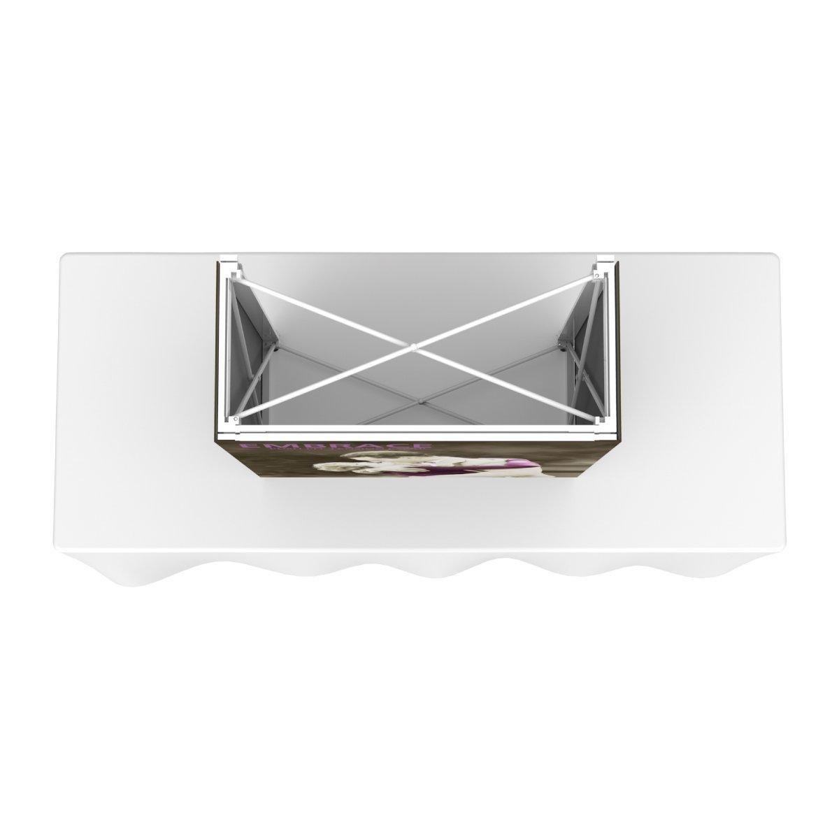 Top view of a tabletop trade show display with an embrace-themed graphic and stable frame structure