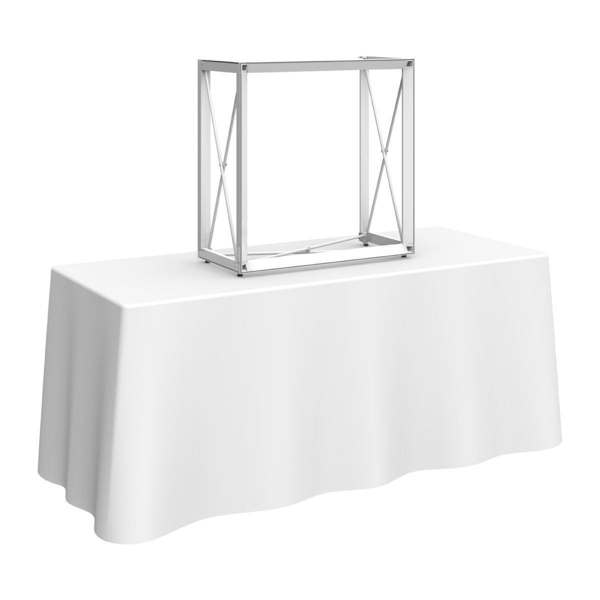 Adjustable tabletop display frame on a draped table for trade shows and special events