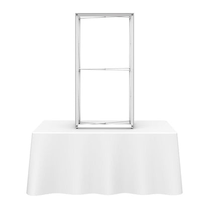 Extra tall tabletop display frame on covered table for trade show and event branding