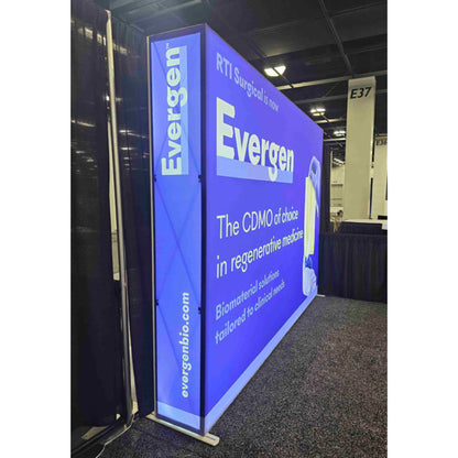 Large illuminated trade show display booth featuring Evergen branding and regenerative medicine messaging at an exhibition