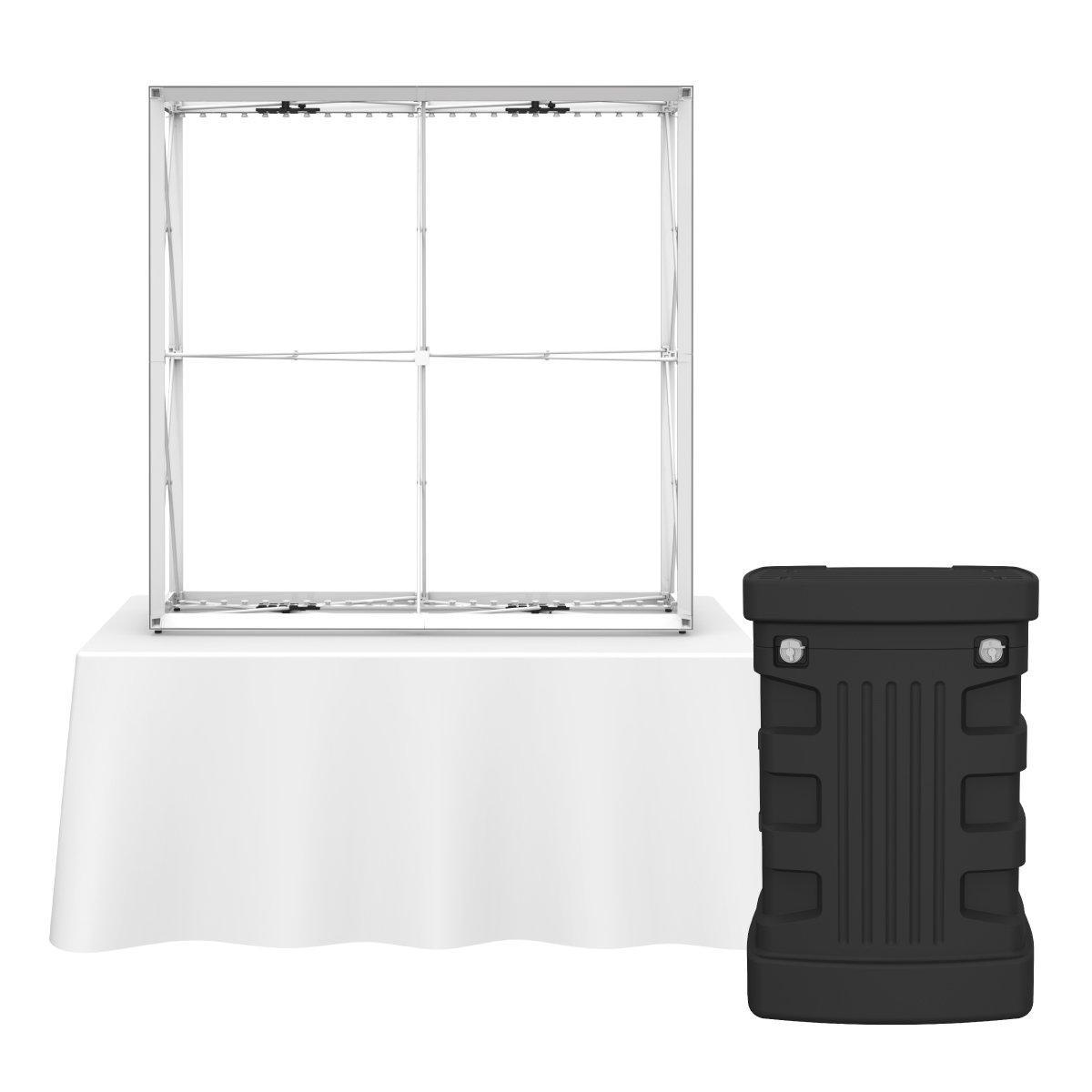 Backlit tabletop display frame on cloth-covered table with portable case for trade shows and events