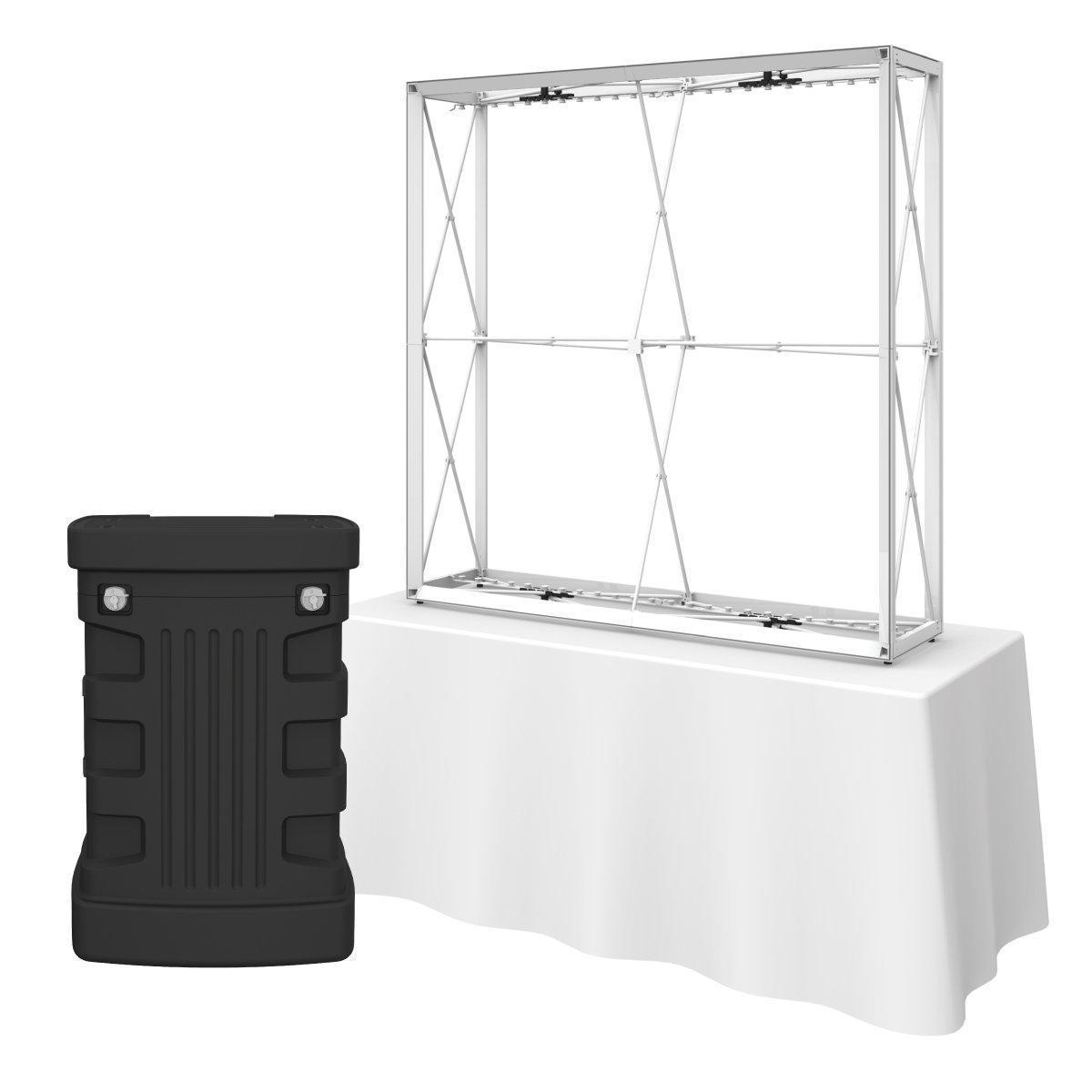 Backlit tabletop display frame setup on table with hard carrying case, ideal for trade shows and exhibitions