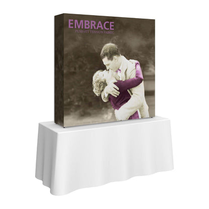 5ft tall tabletop display with vintage embrace photo on tension fabric for trade shows and events