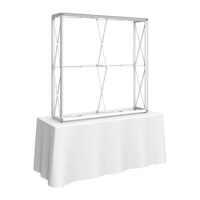 5ft tall expandable tabletop display frame on covered table for trade shows and exhibitions