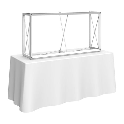 Trade show tabletop display frame with fabric-covered table for exhibitions and special events