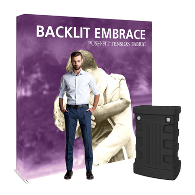 Backlit tension fabric display with case and man standing in front, ideal for trade shows and exhibitions