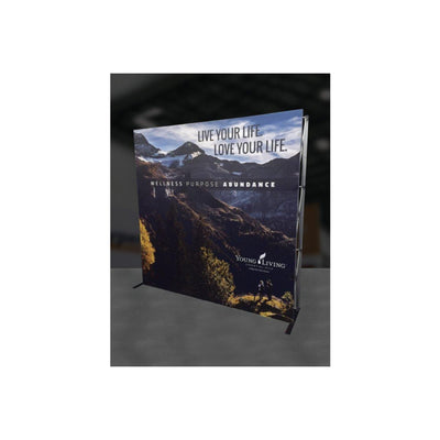 Trade show display showcasing wellness and lifestyle branding with mountain scenery backdrop