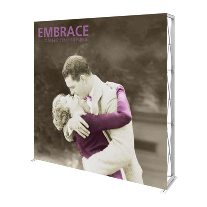 Large fabric trade show display featuring vintage style image of embracing couple with text Embrace Push-Fit Tension Fabric