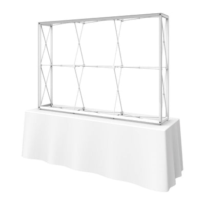 Trade show tabletop display frame mounted on table with tablecloth for exhibitions and events