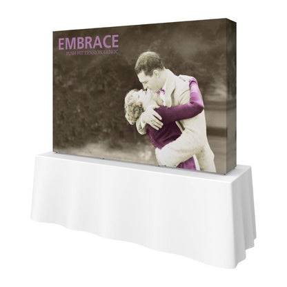 Trade show tabletop display featuring Embrace push-fit tension fabric with vintage couple image