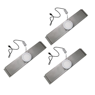 Three flat LED light kits with power cords for trade show and exhibition lighting