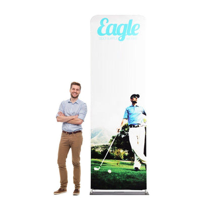 Tall fabric trade show display featuring golf-themed graphics with person standing beside it