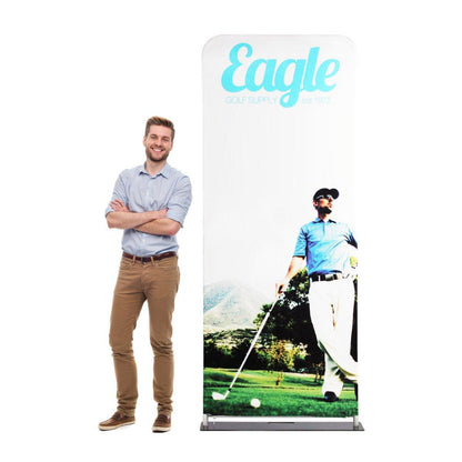 Man standing next to fabric pop-up display banner featuring golf-themed graphic for trade shows and exhibitions