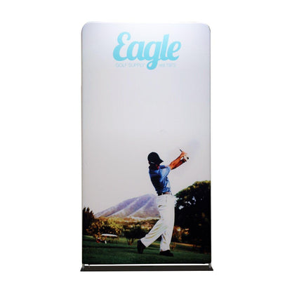 Fabric display featuring golfer swinging club in outdoor scenic setting for trade show or exhibition