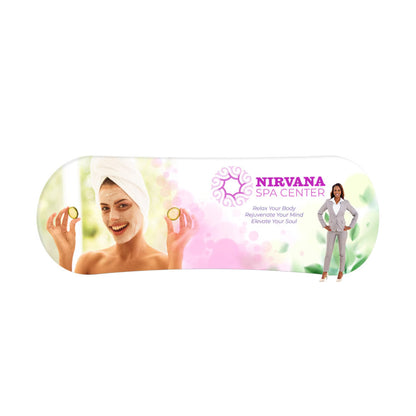 Curved trade show tube graphic featuring spa center branding with smiling woman holding cucumber slices and businesswoman
