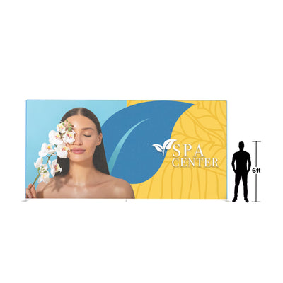 20ft trade show backdrop featuring spa center branding with woman holding orchid flower