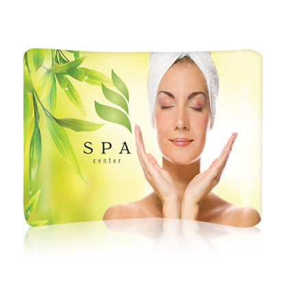 Curved fabric trade show display featuring spa center promotion with relaxing woman and natural leaves
