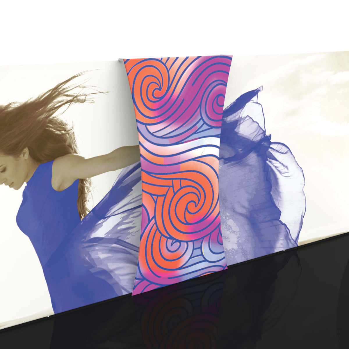 Curved fabric backwall connector with abstract design joining large printed trade show displays