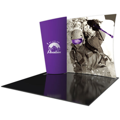 Curved fabric trade show display with mountain adventure graphic and promotional panel for exhibitions