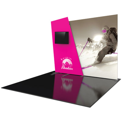 Trade show display with angled panels featuring adventure graphic and mounted monitor for exhibitions