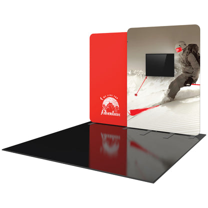 Trade show display booth with large ski adventure graphic and mounted monitor for exhibitions
