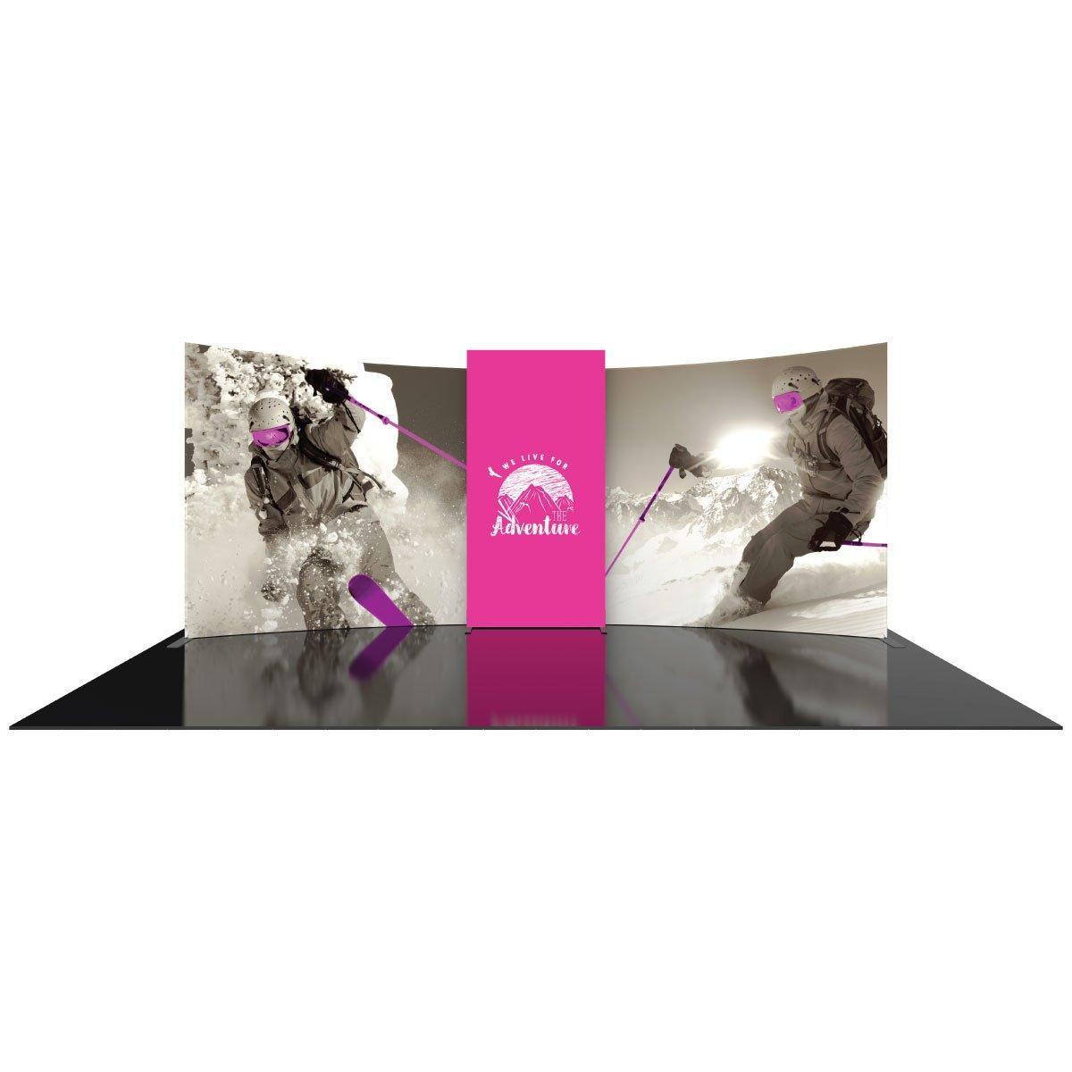 Trade show display kit with curved graphic panels featuring skiing adventure imagery and central branding panel