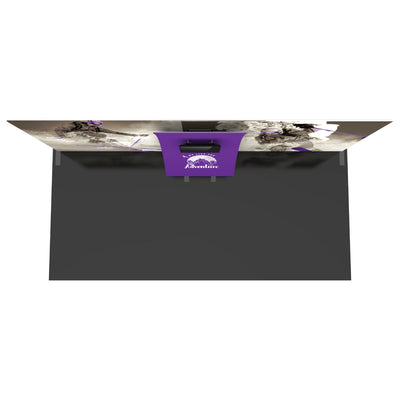 Trade show exhibit display with large adventure sports graphics and central counter for exhibitions and events