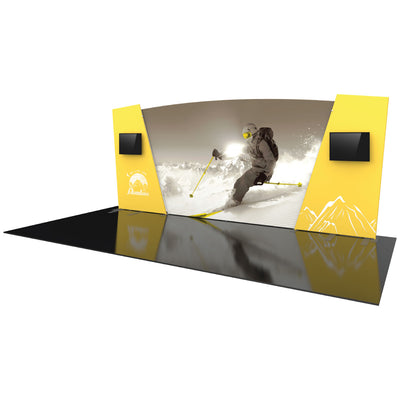 Curved trade show display with skier graphic, dual monitors, and angled side panels for exhibitions