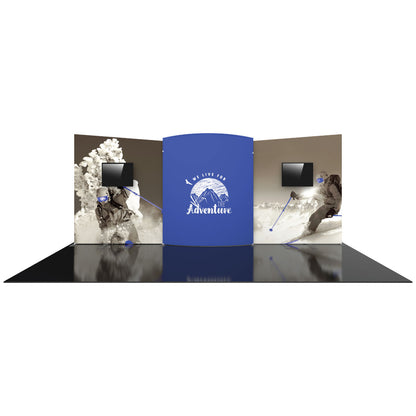 Trade show display with large curved backdrops featuring adventure graphics and screens for exhibitions and events