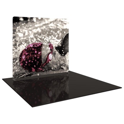 Curved tension fabric trade show display with high-resolution swimmer graphic for exhibitions and events