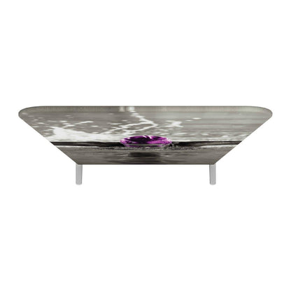 Trade show counter table with custom graphic wrap featuring a water ripple design for exhibitions and event displays