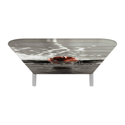 Trade show table with custom printed fabric graphic featuring water and circular object for exhibitions and events