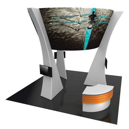 Curved trade show exhibit with large graphic, multiple screens, and reception counter for events